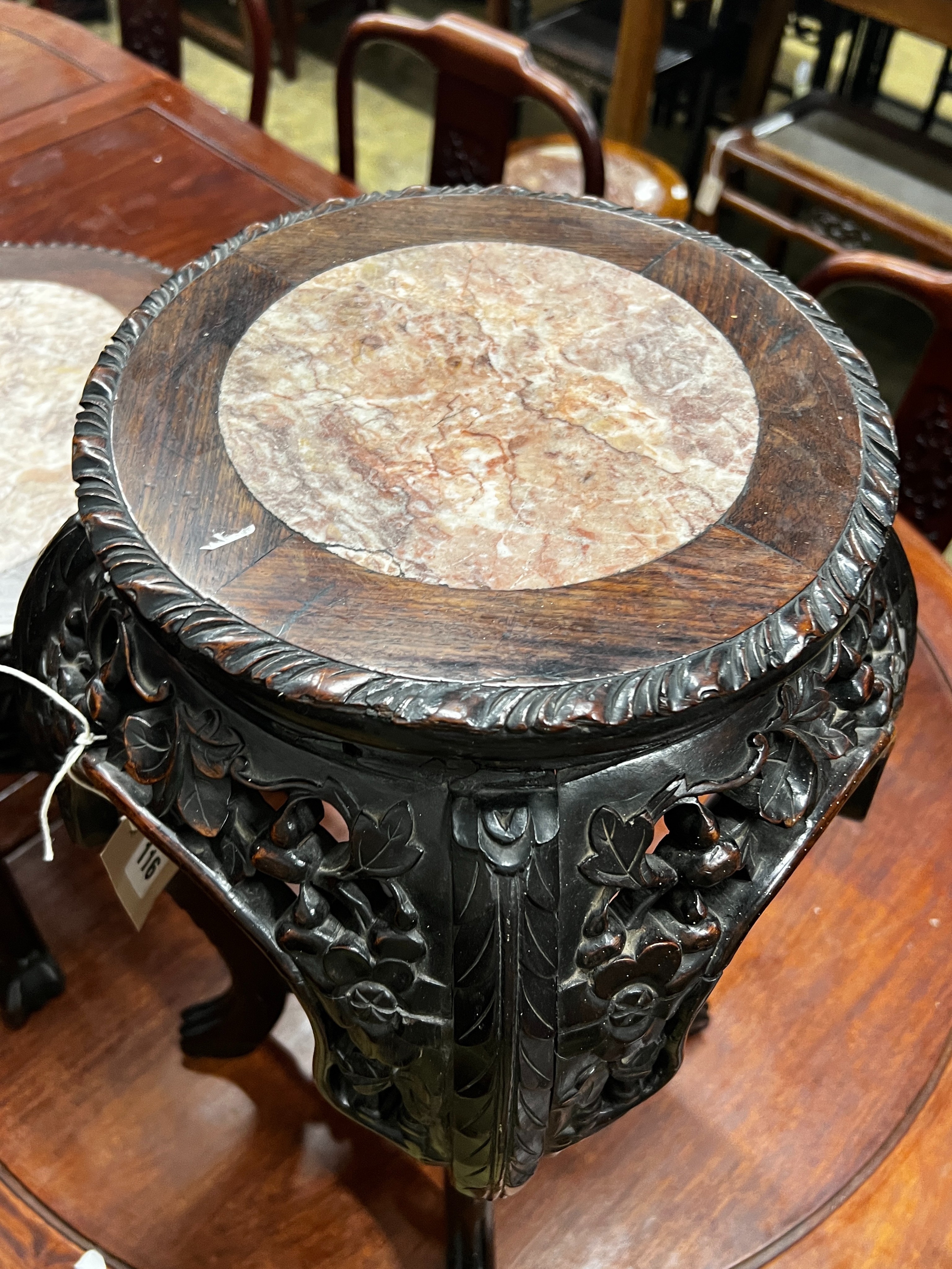 A Chinese circular marble top hongmu vase stand, width 34cm, height 60cm